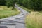 Clad asphalt road in the countryside.