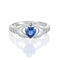 Claddagh ring with blue topaz isolated on white