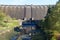 The Claerwen reservoir. Towering dam from below.