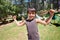 Claiming his camping spot. A boy standing in front of his campsite.