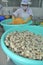 Clams are being washed and packaged in a seafood processing plant in Tien Giang, a province in the Mekong delta of Vietnam