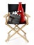 Clapboard and director`s megaphone standing on director`s chair. 3D illustration