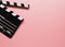 Clapboard on a pink background, movie concept