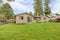 Clapboard siding house with fenced backyard