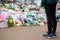 CLAPHAM, LONDON, ENGLAND- 16 March 2021: Flowers and tributes at Clapham Common Bandstand, in memory of Sarah Everard