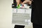 Clapper for shooting movies, A person`s hands, is going to write on the flapper