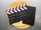 Clapperboard wooden wheel in the background