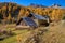 The Claree Upper Valley with larch trees in full autumn colors and the Cerces Massif mountains. Hautes-Alpes, France