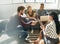 Clarifying their goals for the project. a team of colleagues having a meeting on a sofa in a modern office.