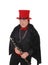 A clarinet player with a red hat and black outfit