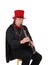 A clarinet player with a red hat and black outfit