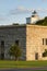 Clark\'s Point Lighthouse Sits on Fort Taber on a Warm Summer Evening