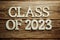 Class of 2023 word alphabet letters on wooden background