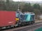 Class 88 electric hauling container train on WCML