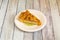 classic apple pie with cream base and slices of roasted apples with