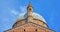 Classic architecture and St. Antony cathedral building with towers and dome against blue sky in Padua, Italy