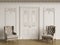 Classic armchais in classic interior. Walls with moldings and de