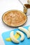 Classic banoffee pie recipe; prepare to put bananas on pie crust coated with caramel sauce.