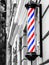 A classic barber logo. Barber shop pole. Logo of the barbershop, symbol. Barbershop pole, retro. Old fashioned vintage