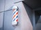 Classic Barber shop Pole on the wall. 3d rendering