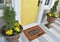 Classic beige and brown zute / coir Outdoor / Indoor Door mat with `Welcome` text inside multi patterned frames