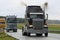 Classic Black Kenworth 900W Truck In Convoy