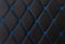 Classic black leather Mat with straight blue stitching soft leather for machine with textured pattern concept background business