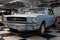 classic blue Ford Mustang from 1965 first generation