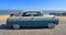 Classic Blue and Grey Ford Zodiac Motor Car Parked on Seafront Promenade.