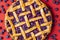 Classic blueberry pie close-up. Blueberries tart with a lattice crust