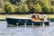 Classic boat cruising on the River Thames