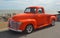 Classic Bright Orange Chevrolet pickup truck