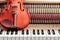 classic brown violin on the close up image of grand piano keys and interior background