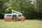 Classic Camper Van Parked in a Field Ready for Camping