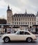 A classic car in the front of book market and the Conciergerie buliding, the river seine bank, Paris, france