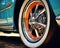 classic car wheels and shiny chrome rim.