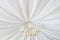 Classic chandelier hanging on ceiling made of white cloth