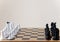 Classic chess pieces on a chessboard. Copy space for text. Chess match. The concept of a successful team work leader. Business