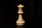 Classic Chess White Queen on black board, isolated