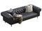 Classic chester black leather upholstery sofa with pillows and pelt. 3d render