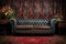 a classic chesterfield sofa in a room with vintage wallpaper