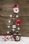 Classic christmas decoration in red and white: wooden tree.