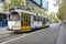 Classic city tram moving along Swanston Street