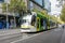 Classic city tram traveling along Swanston Street