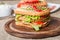 Classic club sandwich with bacon and vegetables