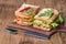 Classic club sandwich with bacon and vegetables