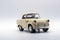 Classic, cream-colored, miniature car model