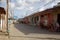 Classic cuban backstreet with bike and rickshaw