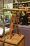 Classic design telescope with wooden leg support in a shop selling vintage goods