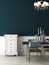 Classic dining room mockup with dark teal wall, white molding wall, classic hanging lamp, and classic furniture